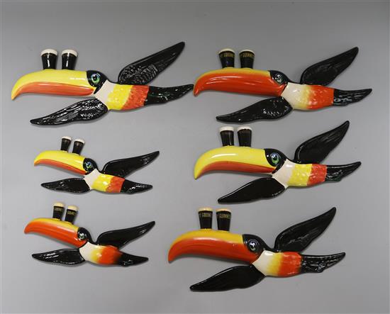 Two Carlton ware Guinness advertising sets of three graduated toucan wall plaques (6)